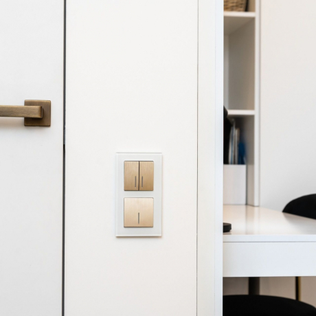 Выключатель двухклавишный проходной с подсветкой (шампань рифленый) Werkel 90504