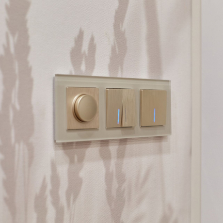 Выключатель двухклавишный проходной с подсветкой (шампань рифленый) Werkel 90504